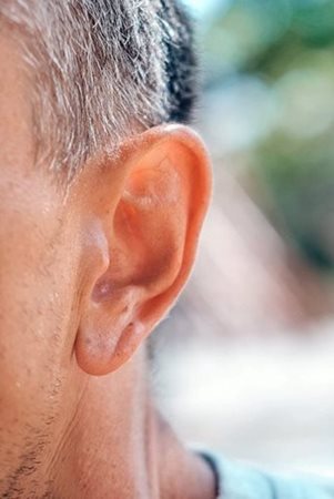 close up of mans ear